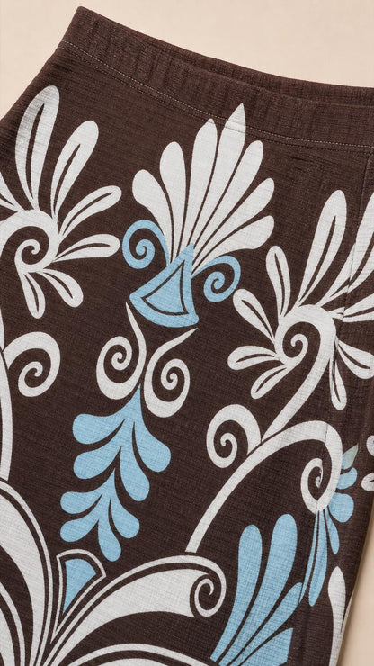 Close-up detail of the vintage-inspired brown and blue fabric print