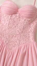 Close-up of pink lace corset bodice and sweetheart neckline