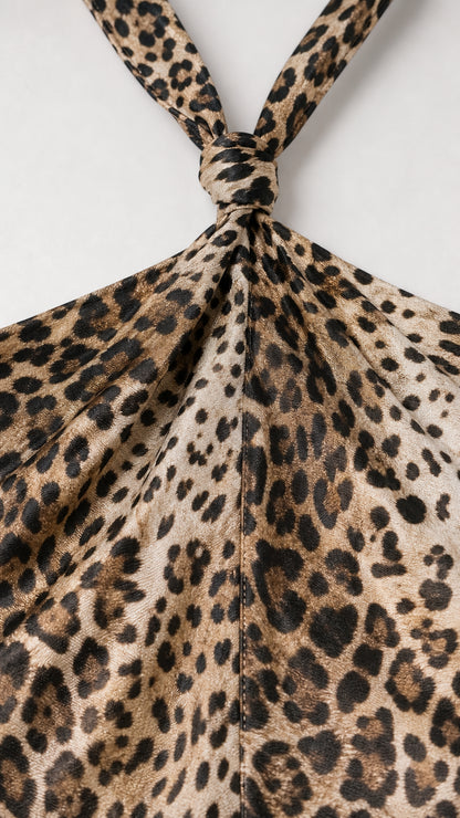 Close-up of the halter neck knot and fabric texture