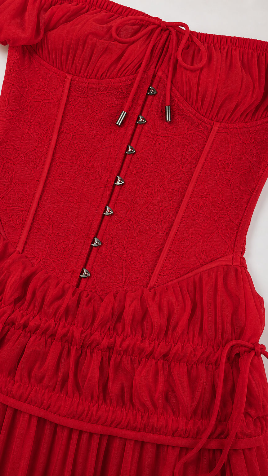 Close-up detail of front hook corset bodice and drawstring on red dress