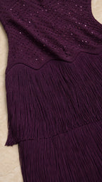 Close-up of bodice sequin pattern and fringe texture in purple