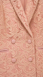 Close up of apricot lace blazer lapel and buttons