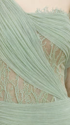 Close-up detail of draped tulle and embroidered lace bodice