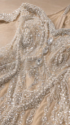 Close-up detail of intricate beadwork and crystal embellishments