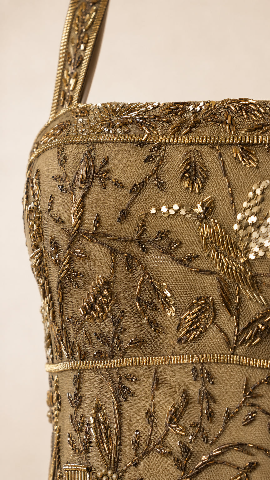 Close-up detail of metallic bead and sequin embroidery