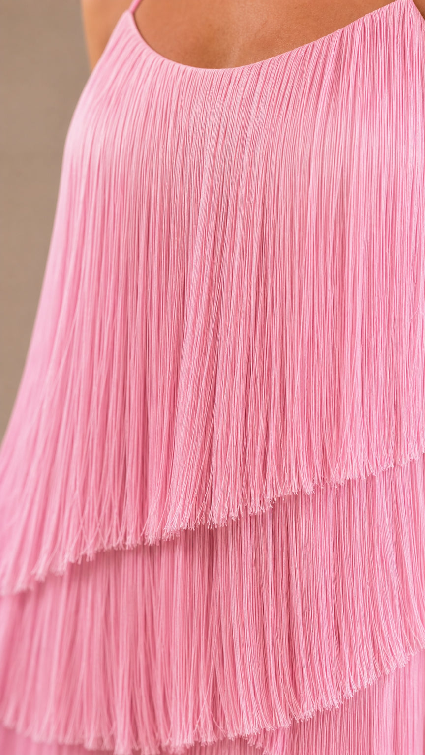 Close-up detail of the cascading pink fringe layers