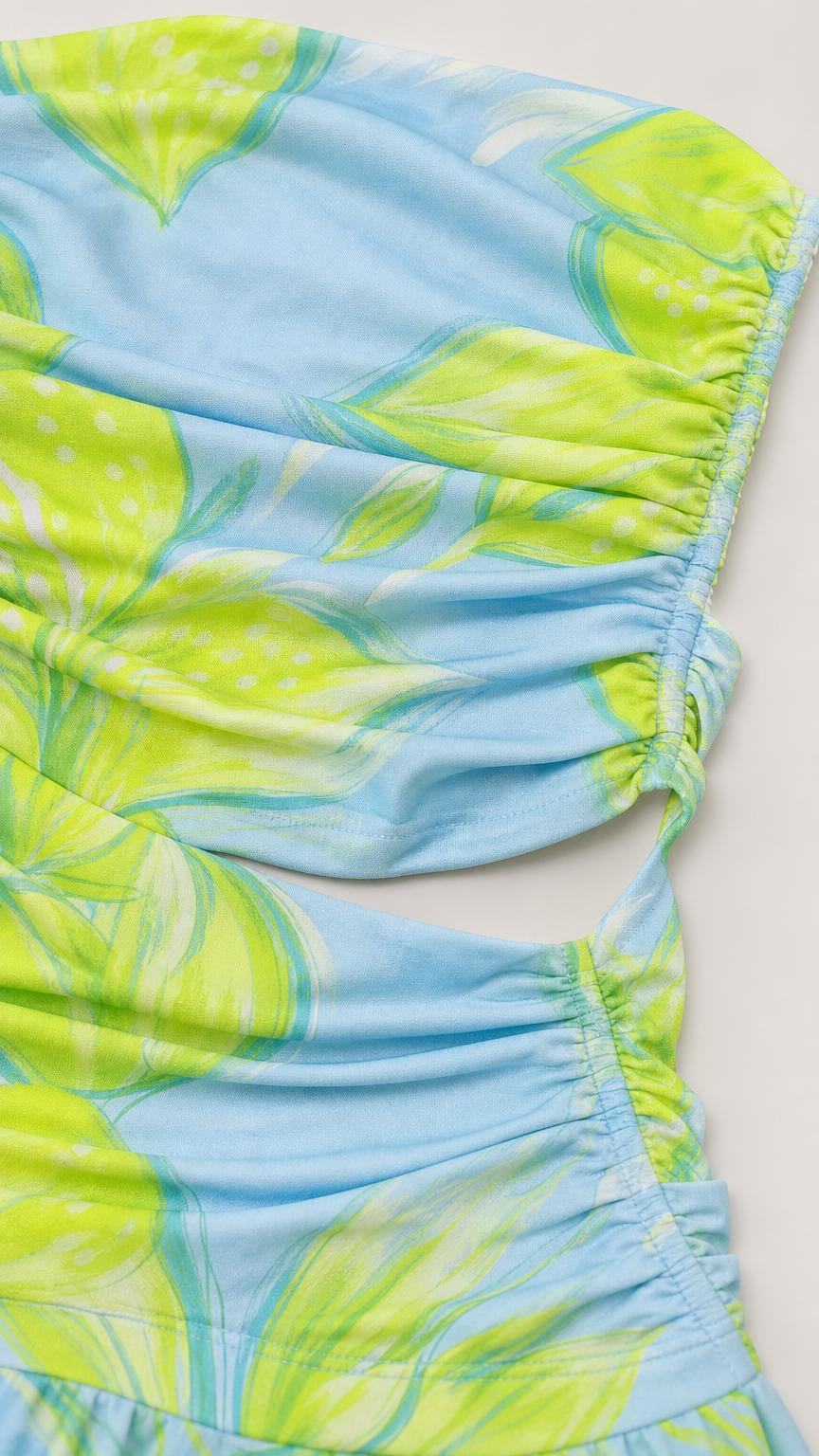 Close-up detail of blue floral print fabric and ruching