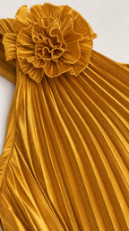 Close-up of shoulder rosette and pleating detail