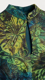 Close up of mandarin collar and keyhole detail on dress