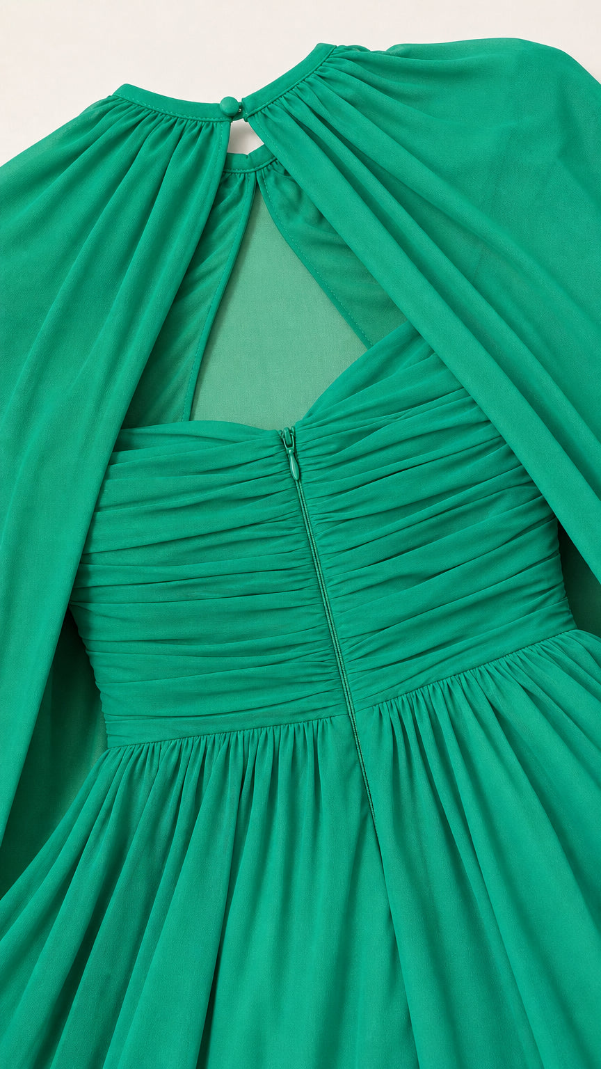 Close-up of the back keyhole and ruched bodice details