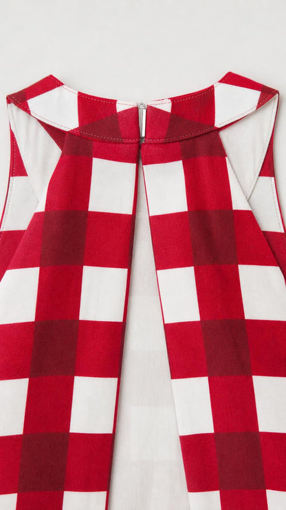 Close-up of the red gingham pattern and neckline construction