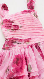 Close-up detail of pleated bodice and floral fabric