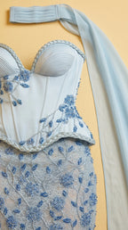 Close-up detail of sweetheart corset bodice and floral beading
