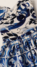 Close-up detail of the sweetheart neckline and artisan-inspired print