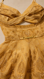 Close-up detail of bodice cutout and patterned fabric