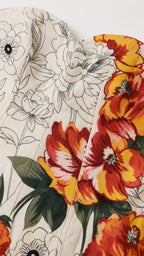 Close-up detail of the fabric texture and floral print