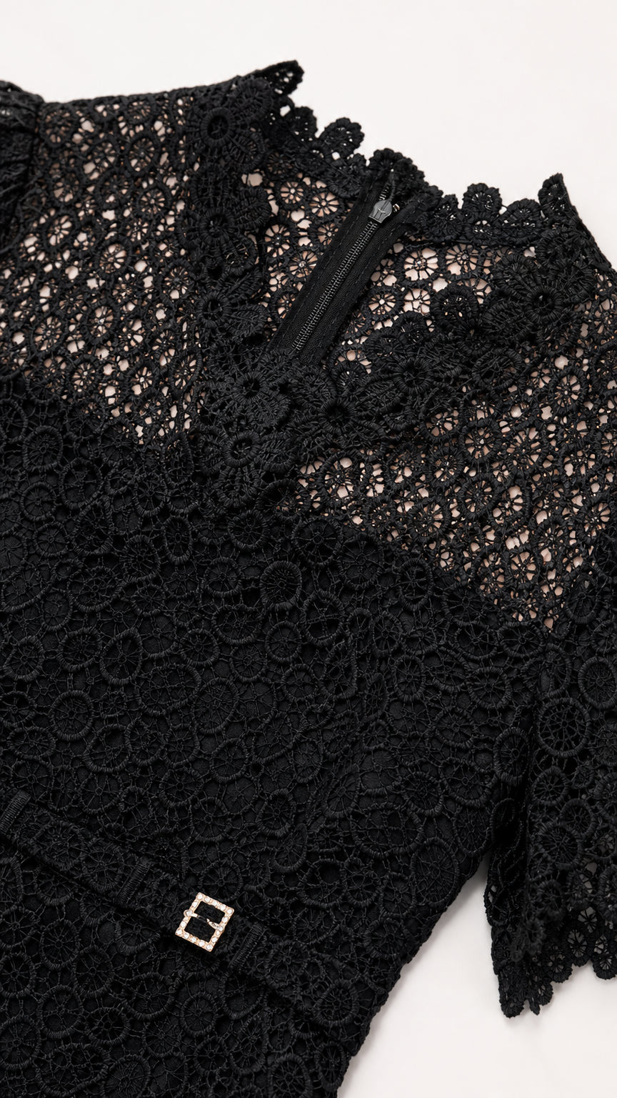 Close-up detail of upper bodice and lace texture