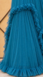 Close-up detail of tiered tulle ruffles on the skirt