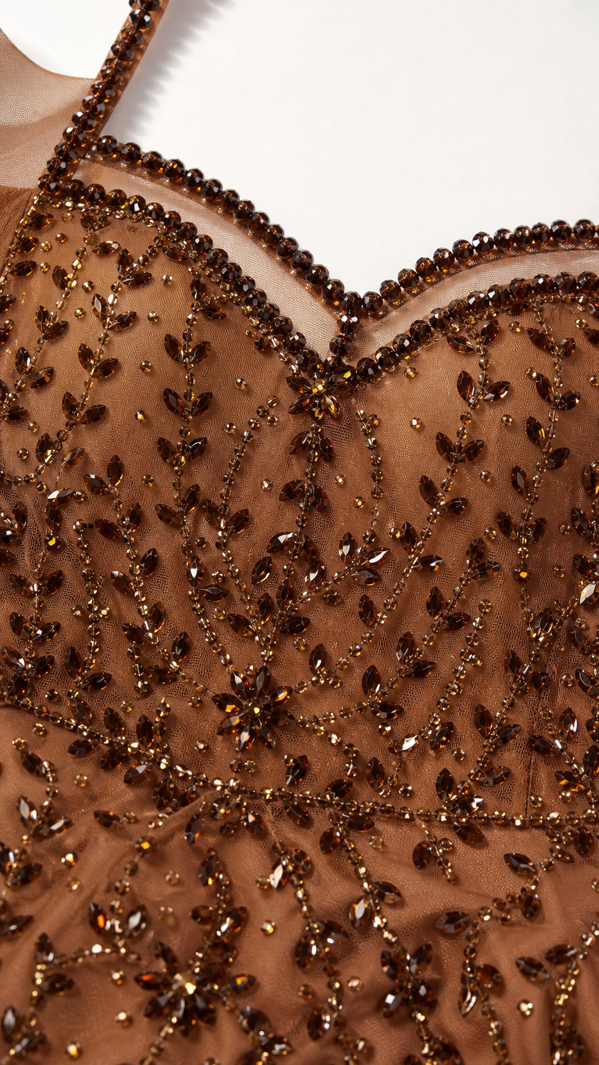 Close-up detail of sweetheart neckline and heavy beadwork