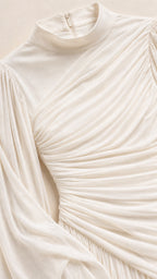 Close-up of high neckline and draped bodice detail in Ivory