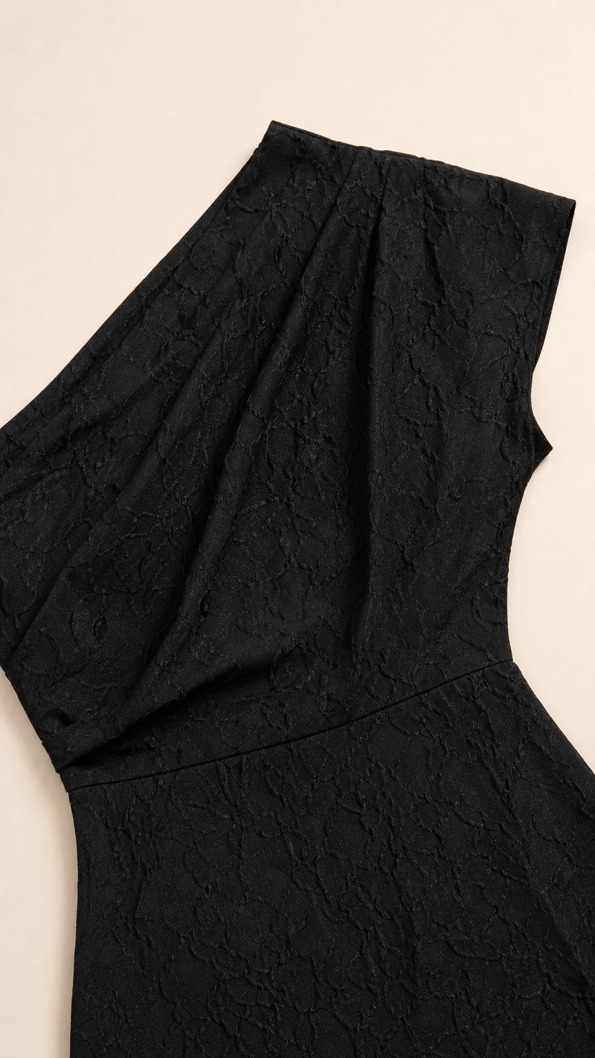 Close-up detail of the draped one-shoulder bodice in Black