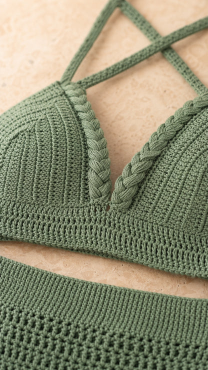Close-up detail of sage green braided crochet halter top