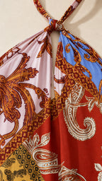 Close up of halter neck tie and paisley print detail
