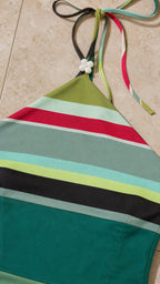 Close-up of halter neck straps and stripe detail