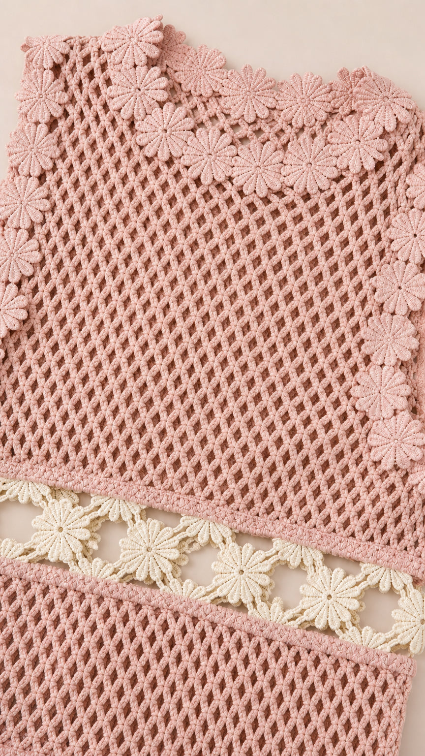 Close-up detail of floral crochet pattern and hem