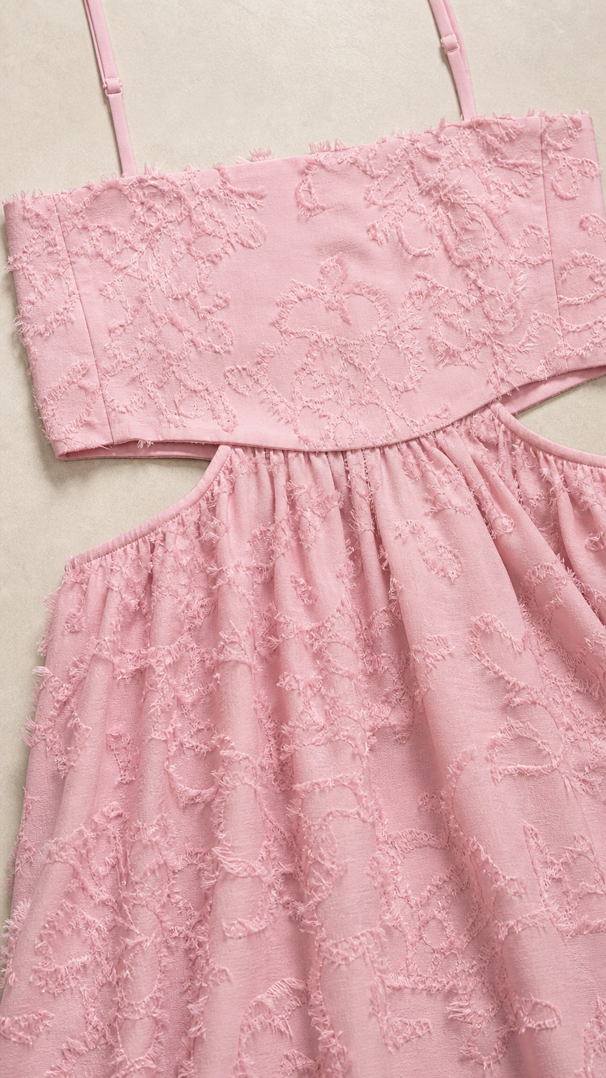 Close-up of textured fabric and cutout detail