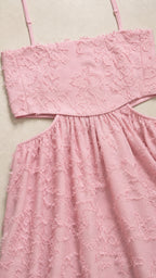 Close-up of textured fabric and cutout detail