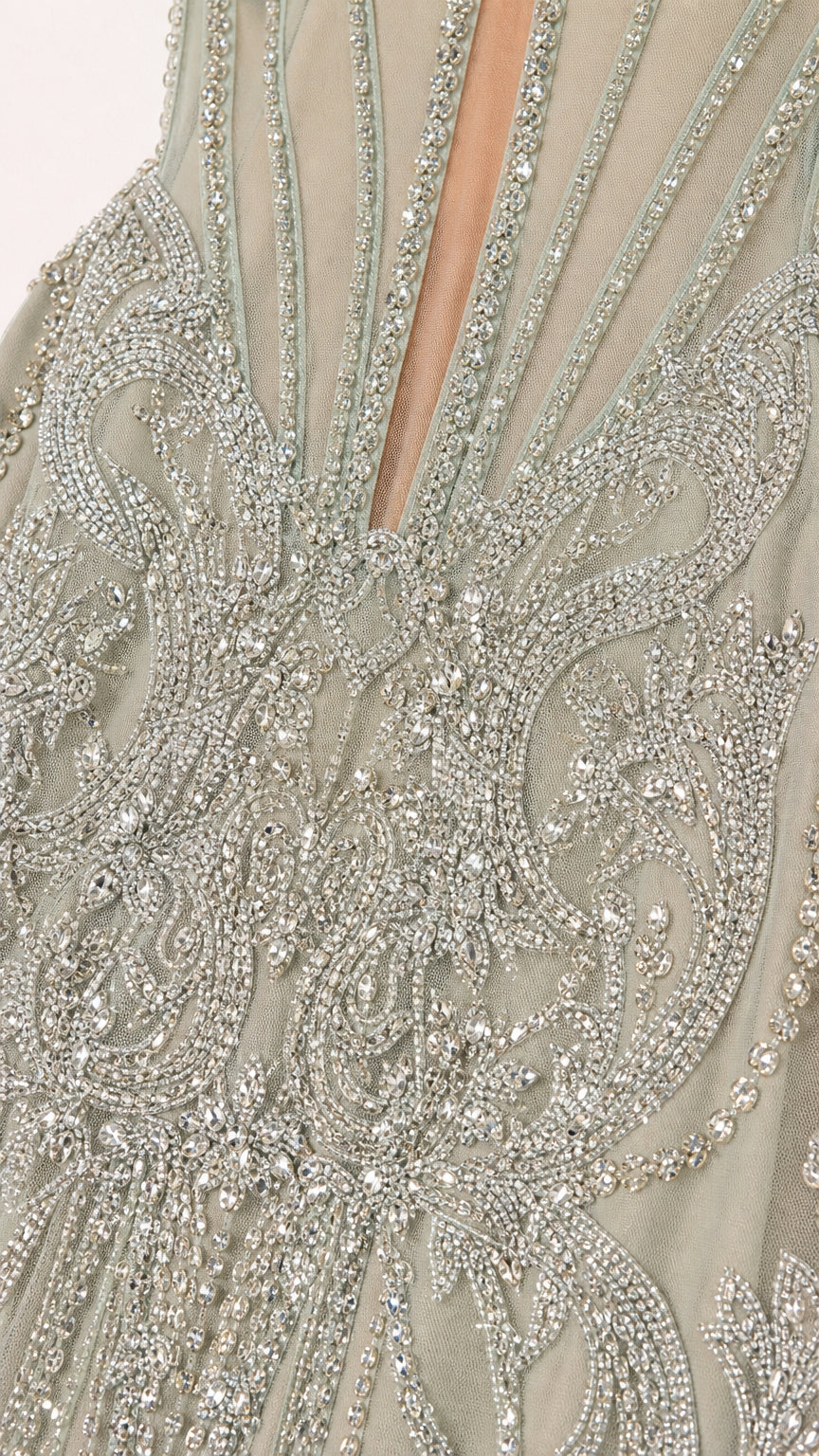 Close-up detail of rhinestone and bead embroidery on bodice