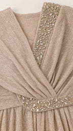 Close up of crystal rhinestone embellishment on dress neckline and waist