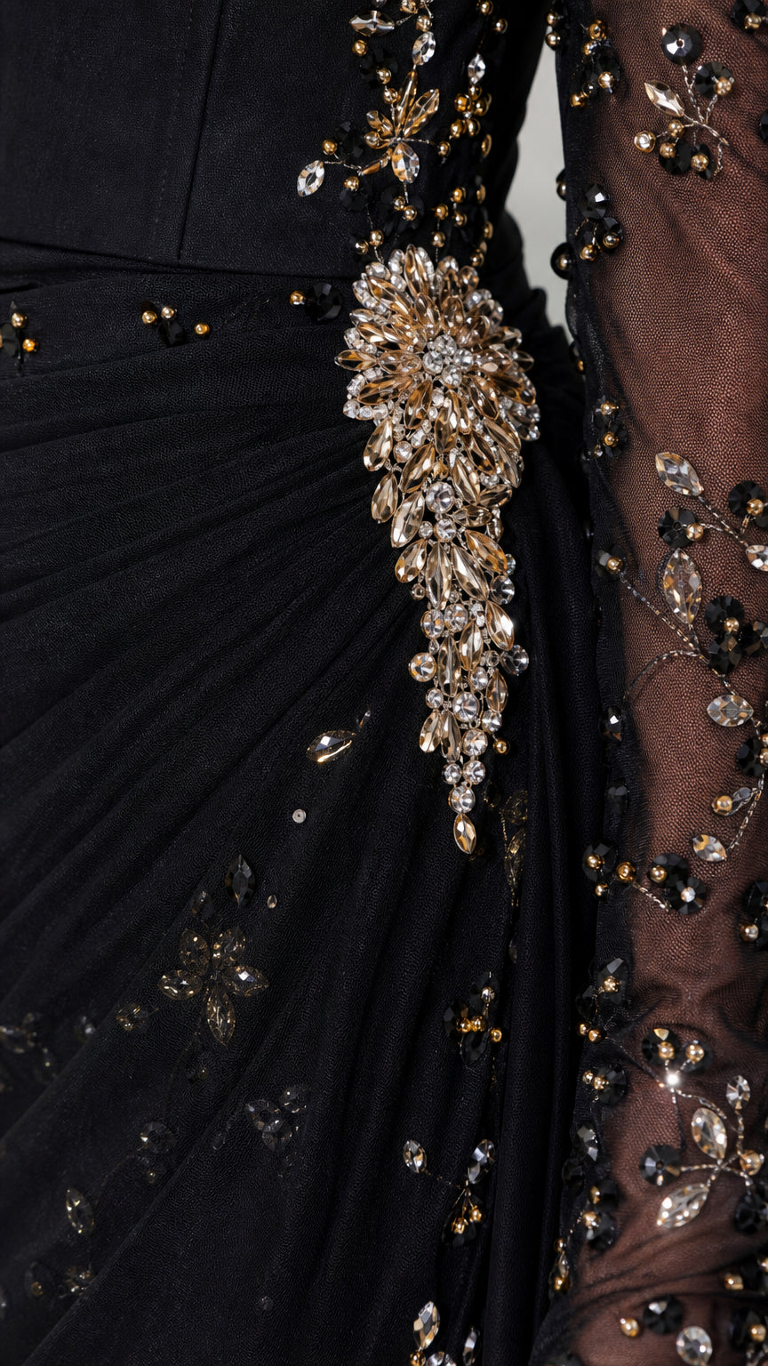 Close-up detail of rhinestone waist appliqué and crystal beadwork