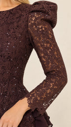 Close-up of sleeve and shoulder detail on dark brown lace dress