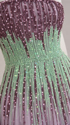 Close-up detail of sequin and bead pattern on gown
