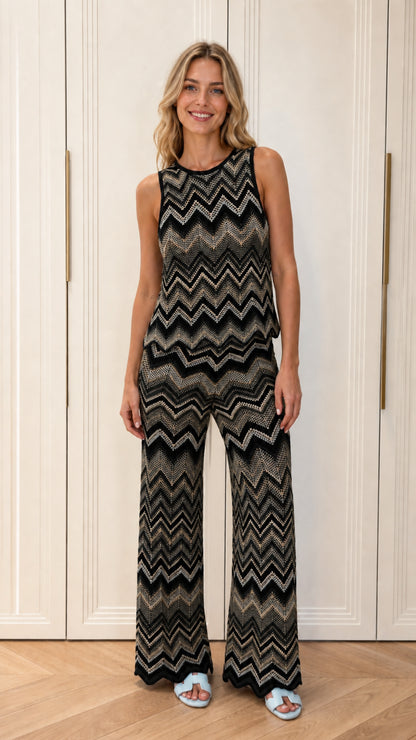 Woman wearing black chevron knit matching set