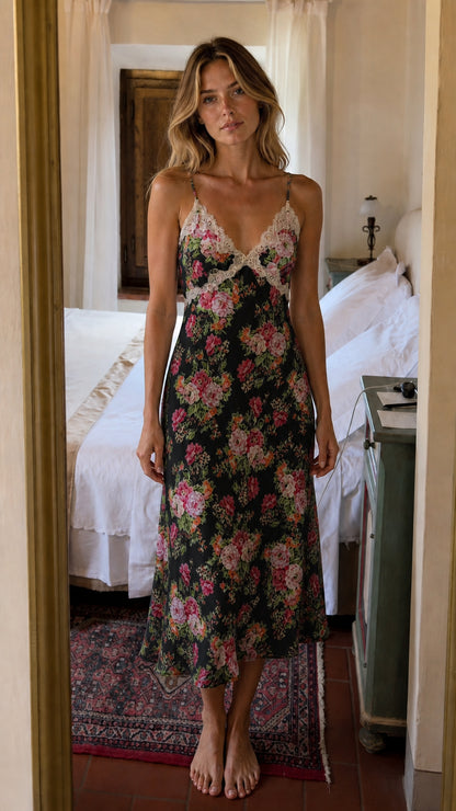 Front view of woman wearing Black floral lace trim cami midi slip dress
