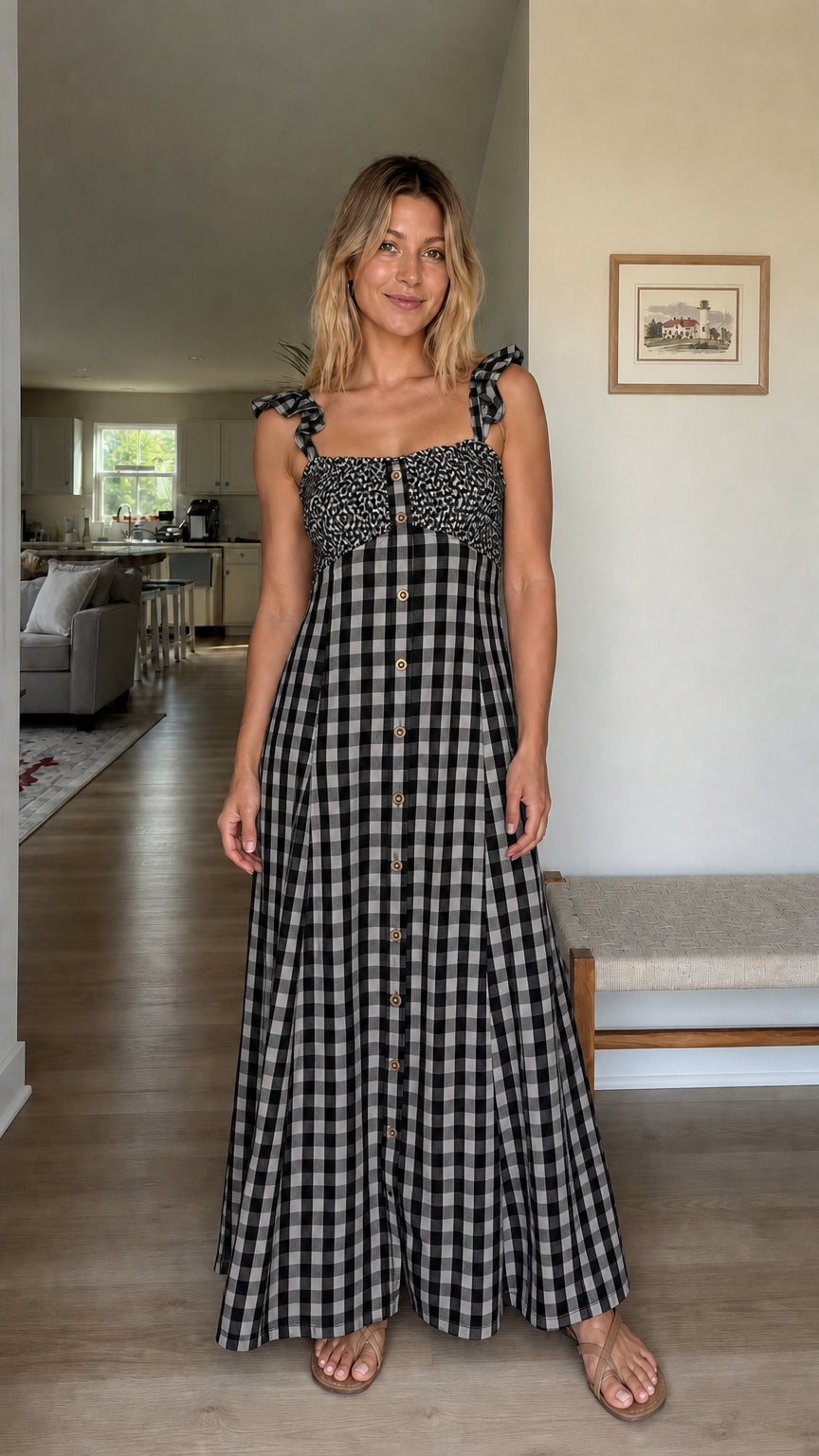 Woman wearing black and white gingham maxi dress
