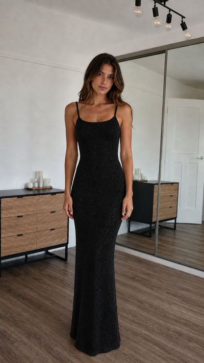 Front view of model wearing black sparkle knit maxi dress