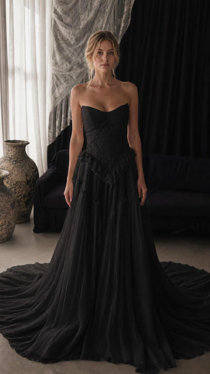 Front view of black strapless lace corset tulle evening gown