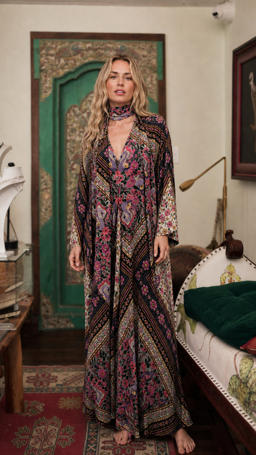 Model wearing black bohemian floral maxi dress