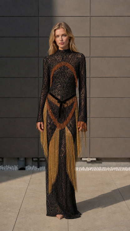 Model wearing black metallic crochet fringe maxi dress