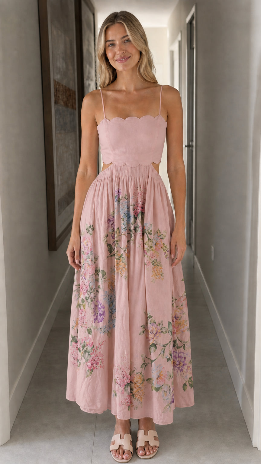 Woman wearing pink floral cutout midi dress
