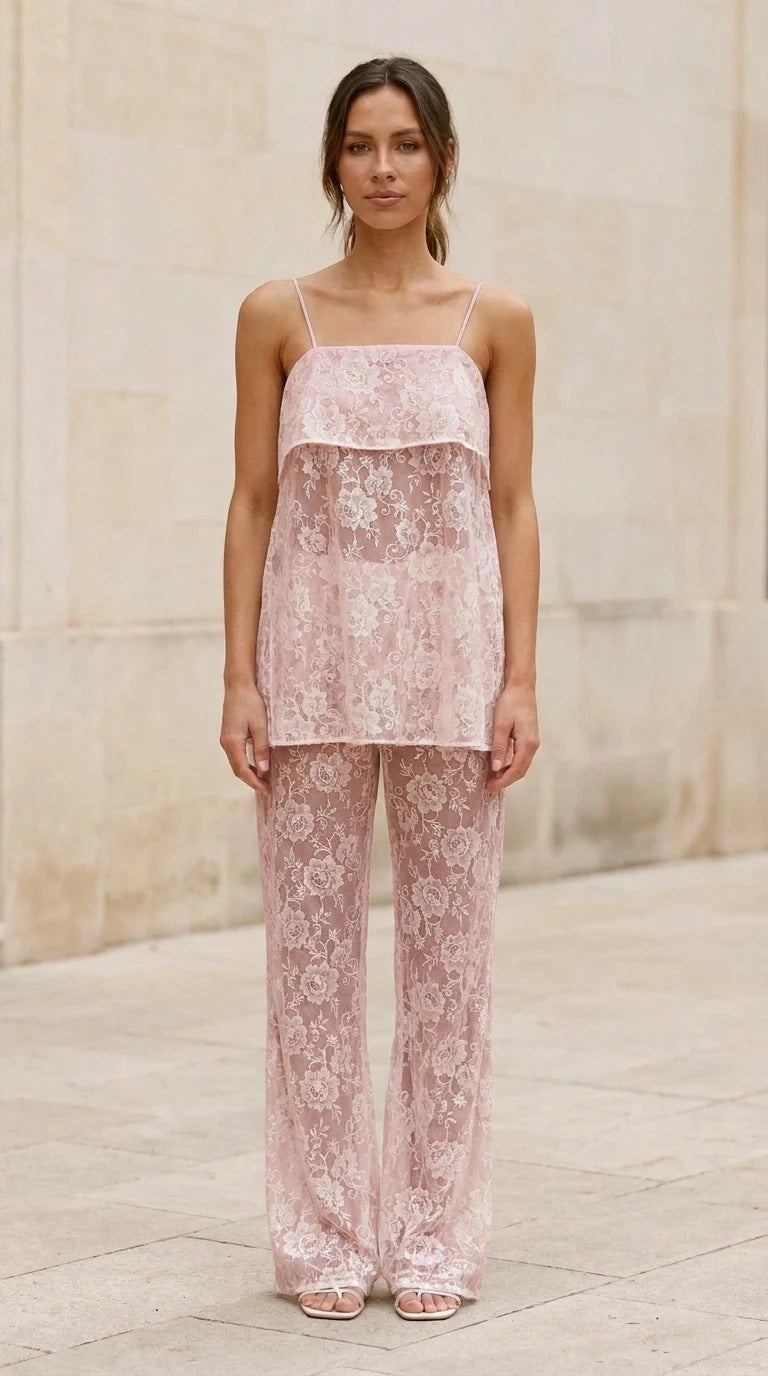 Model wearing pink lace cami top and matching pants