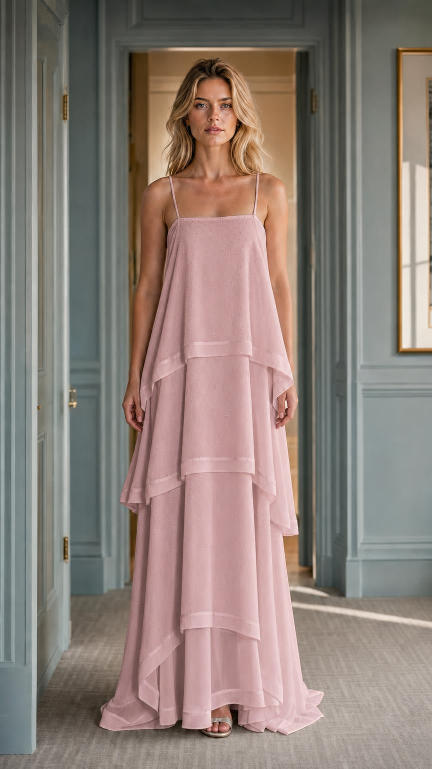 Front view of woman wearing dusty rose tiered maxi dress