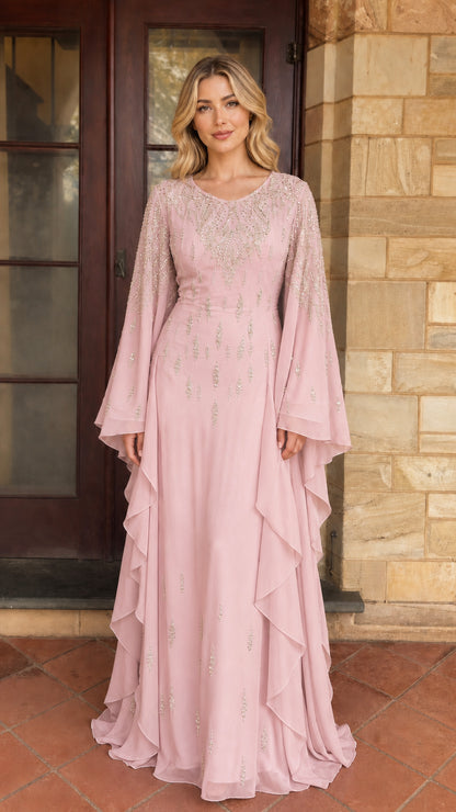 Model wearing pink beaded long sleeve maxi dress