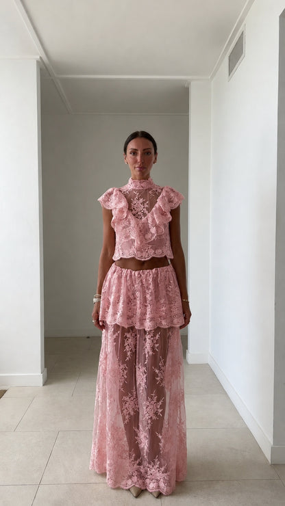 Model wearing pink lace two-piece set