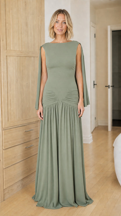 Front view of woman wearing sage green occasion maxi dress