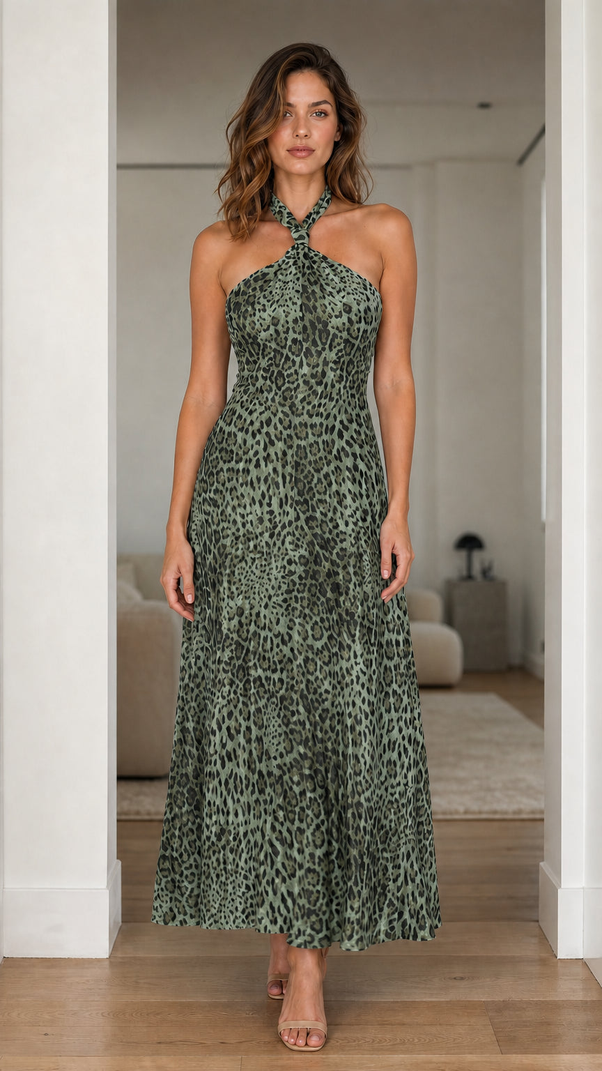 Model wearing sage green variant of the leopard print maxi dress